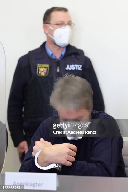 Year-old man accused of shooting a petrol station attendant to death over a disagreement about wearing a protective face mask arrives for the first...