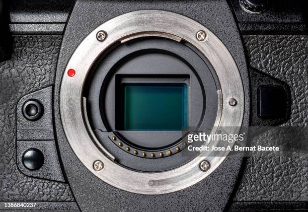 view of the sensor of a mirrorless camera. - camera shutter stock-fotos und bilder