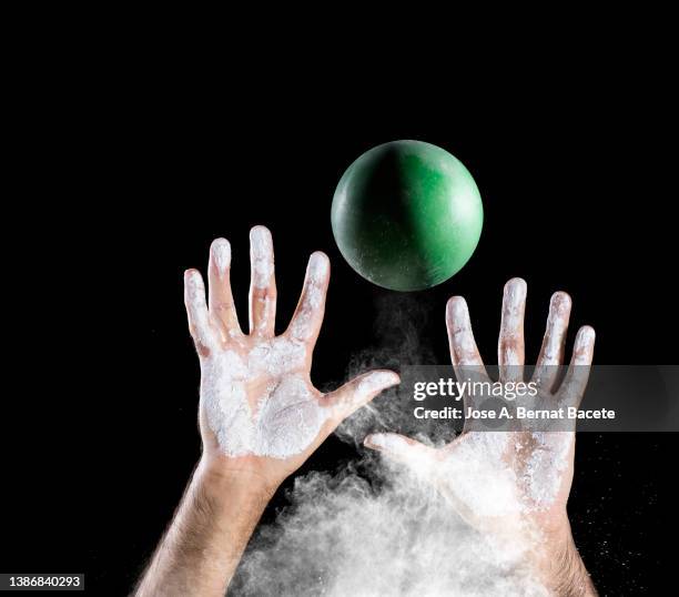 hands of a man playing sports with a ball. - ballon rebond stock pictures, royalty-free photos & images