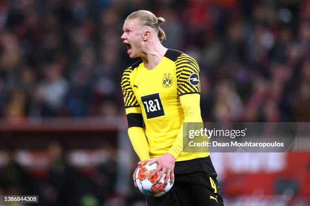 Erling Haaland of Borussia Dortmund reacts to a missed chance on goal during the Bundesliga match between 1. FC Köln and Borussia Dortmund at...