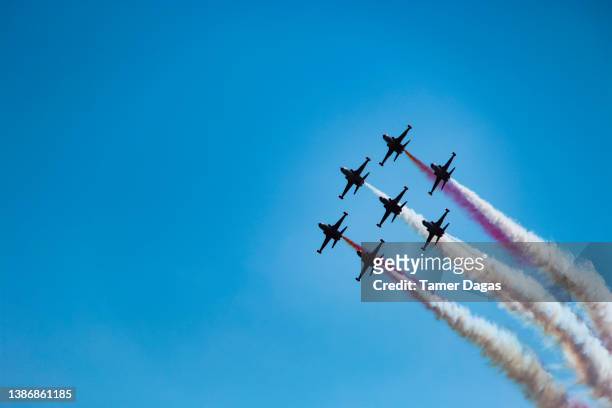 jets showing off in the sky - airshow stock pictures, royalty-free photos & images