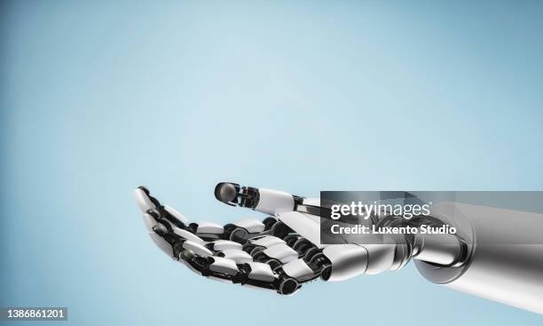 robot's mechanical arm reach out to help and support or serve as template for carrying goods on blank empty hand. innovative technology and artificial intelligence concept. 3d illustration rendering - cyborg bildbanksfoton och bilder