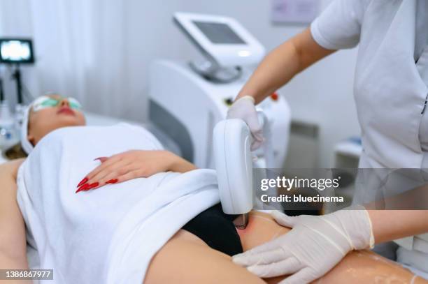 epilation with diod laser - laser stock-fotos und bilder