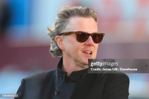 Steve McManaman, pundit for BT Sport, looks on during the Premier League match between Aston Villa and Arsenal at Villa Park on March 19, 2022 in...