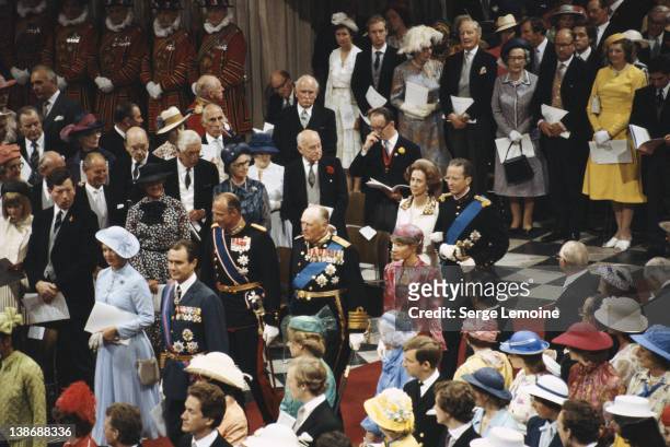 Guests arrive at the wedding of Charles, Prince of Wales, and Lady Diana Spencer in St Paul's Cathedral, London, 29th July 1981. In front are Queen...