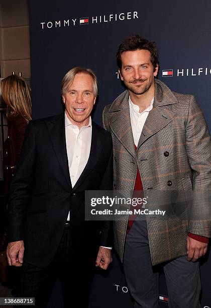 Designer Tommy Hilfiger and actor Bradley Cooper pose backstage at the Tommy Hilfiger Presents Fall 2012 Men's Collection show during Mercedes-Benz...