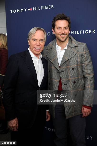Designer Tommy Hilfiger and actor Bradley Cooper poses backstage at the Tommy Hilfiger Presents Fall 2012 Men's Collection show during Mercedes-Benz...