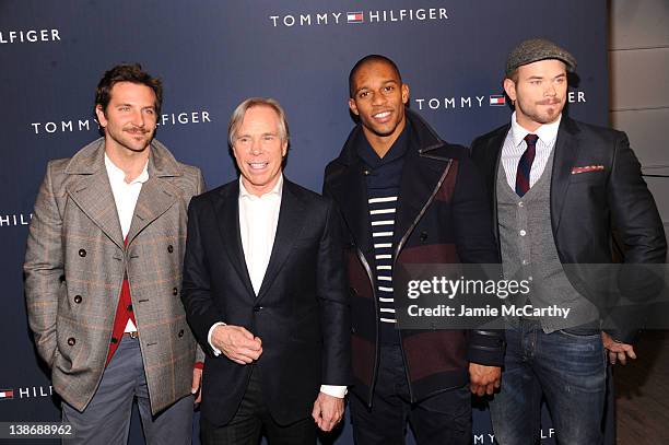 Actor Bradley Cooper, Designer Tommy Hilfiger, New York Giants wide receiver Victor Cruz and actor Kellen Lutz pose backstage at the Tommy Hilfiger...