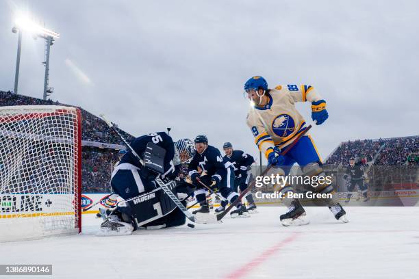 Alex Tuch of the Buffalo Sabres shoots against Petr Mrazek of the Toronto Maple Leafs at the 2022 Tim Hortons NHL Heritage Classic at Tim Hortons...