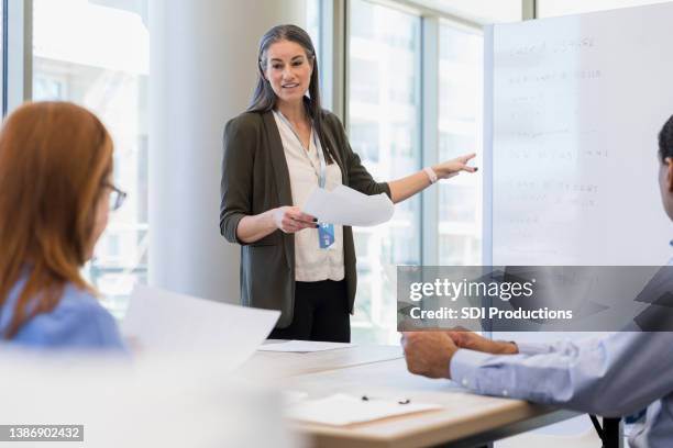 comptroller gives updated data - hospital-administrator stock pictures, royalty-free photos & images