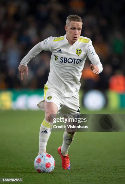 Adam Forshaw of Leeds United in action during the Premier League match between Wolverhampton Wanderers and Leeds United at Molineux on March 18, 2022...