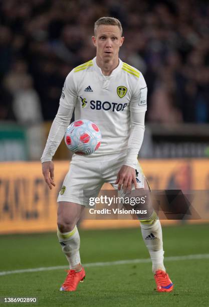 Adam Forshaw of Leeds United in action during the Premier League match between Wolverhampton Wanderers and Leeds United at Molineux on March 18, 2022...