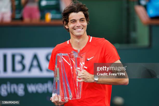 Taylor Fritz Of the United States celebrates winning the men's final of the BNP Paribas Open after beating Rafael Nadal on March 20, 2022 in Indian...