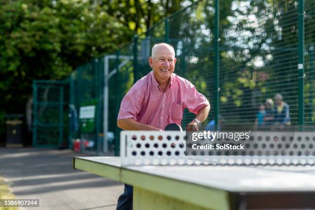 a fit and healthy senior - men's table tennis stock pictures, royalty-free photos & images