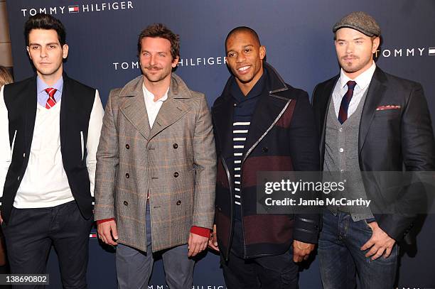 Singer Gabe Saporta, actor Bradley Cooper, New York Giants wide receiver Victor Cruz and actor Kellan Lutz pose backstage at the Tommy Hilfiger...