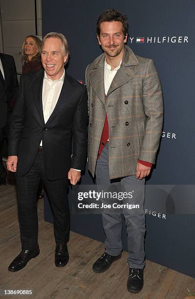 Designer Tommy Hilfiger and actor Bradley Cooper pose backstage at the Tommy Hilfiger Men's Fall 2012 fashion show during Mercedes-Benz Fashion Week...