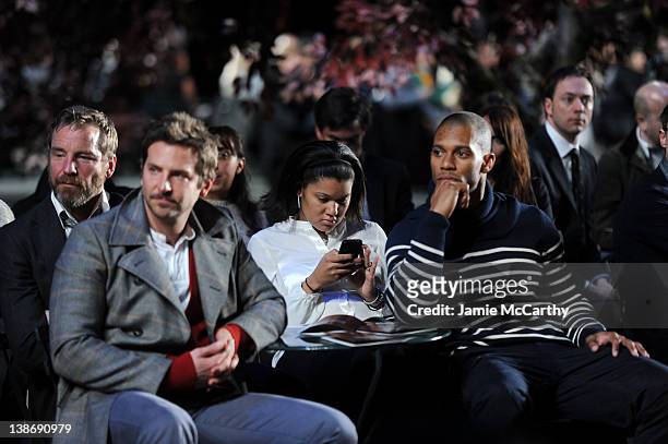 Actor Bradley Cooper, and New York Giants wide receiver Victor Cruz attend Tommy Hilfiger Presents Fall 2012 Men's Collection show during...