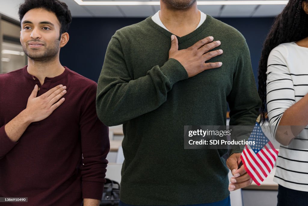 Classmates stand proudly