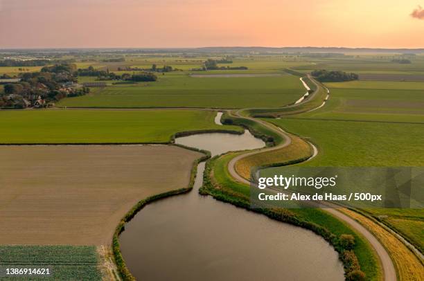 westfriese omringdijk near the village of eenigenburg,holland,netherlands - luchtfoto ストックフォトと画像