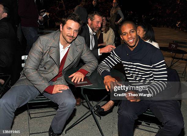 Actor Bradley Cooper and New York Giants wide receiver Victor Cruz attends Tommy Hilfiger Presents Fall 2012 Men's Collection show during...