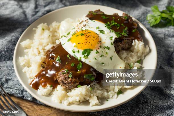 homemade hawaiian loco moco,close-up of food in plate on table - hawaii loco moco stock pictures, royalty-free photos & images