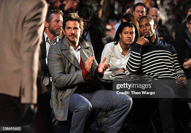 Actor Bradley Cooper and New York Giants wide receiver Victor Cruz attend Tommy Hilfiger Presents Fall 2012 Men's Collection show during...