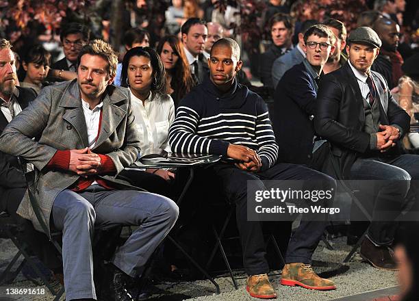 Actor Bradley Cooper, New York Giants wide receiver Victor Cruz, Giles Matthey and actor Kellen Lutz attend Tommy Hilfiger Presents Fall 2012 Men's...