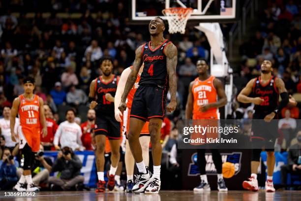 Taze Moore of the Houston Cougars reacts after drawing a foul during the game against the Illinois Fighting Illini during the second round of the...