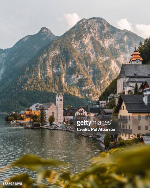 scenic view of famous hallstatt mountain village with hallstatter lake. - tyrol austria stock pictures, royalty-free photos & images