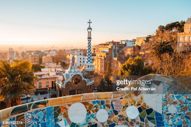 barcelona at sunrise viewed from park guell, barcelona, catalonia, spain. - barcelona spain stock pictures, royalty-free photos & images