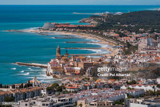 aerial view of the touristic town of sitges in barcelona, catalonia, spain. - barcellona stock-fotos und bilder