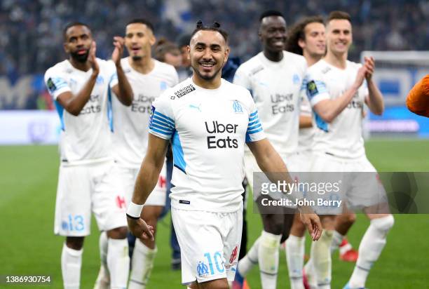 Dimitri Payet of Marseille and teammates celebrate the victory following the Ligue 1 Uber Eats match between Olympique de Marseille and OGC Nice at...