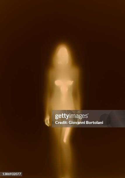woman body behind the veil, blurred silhouette in backlight - female body stock pictures, royalty-free photos & images
