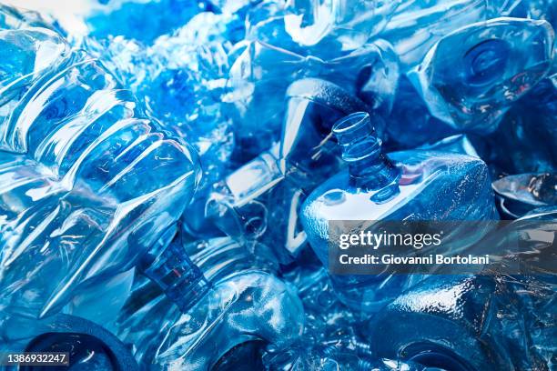 waste of plastic bottles collected for environmental recycling - plastic pollution stock pictures, royalty-free photos & images