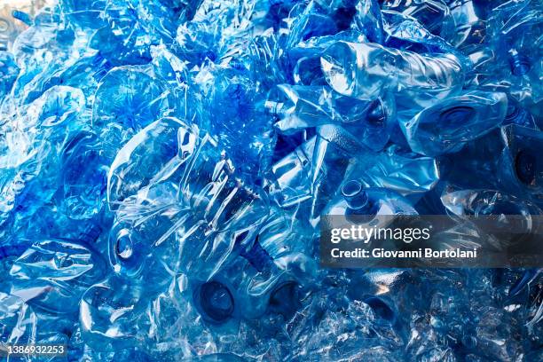 waste of plastic bottles collected for environmental recycling - glasbak stockfoto's en -beelden