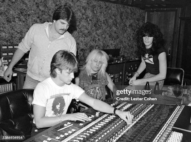 American musician Vince Neil and American musician Tommy Lee, of the American heavy metal band Mötley Crüe, sit in the recording studio with...