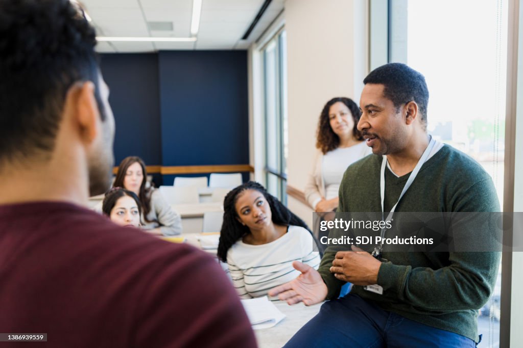 Tutor addresses the class