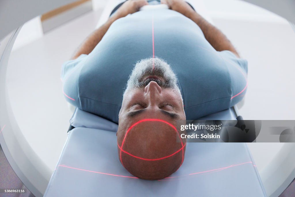 Mature patient in medical x-ray scanner