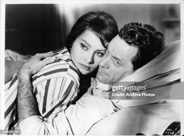 Sophia Loren in bed with William Holden in a scene from the film 'The Key', 1958.