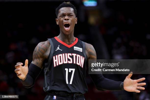 Dennis Schroder of the Houston Rockets reacts to a foul called on him during the first quarter against the Washington Wizards at Toyota Center on...