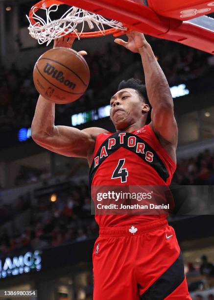 Scottie Barnes of the Toronto Raptors dunks against the Chicago Bulls at the United Center on March 21, 2022 in Chicago, Illinois. NOTE TO USER: User...
