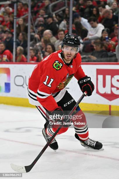 Taylor Raddysh of the Chicago Blackhawks skates against the Winnipeg Jets on March 20, 2022 at the United Center in Chicago, Illinois.
