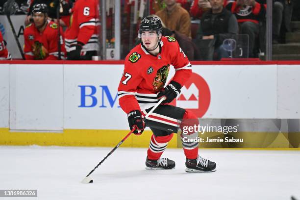 Kirby Dach of the Chicago Blackhawks skates against the Winnipeg Jets on March 20, 2022 at the United Center in Chicago, Illinois.