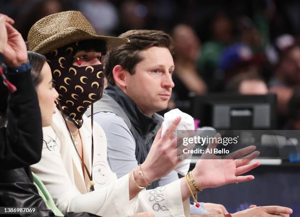 Rapper Bad Bunny looks on during the game between the Brooklyn Nets and the Utah Jazz at Barclays Center on March 21, 2022 in New York City. NOTE TO...