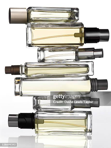fragrance bottles - perfume sprayer stock pictures, royalty-free photos & images