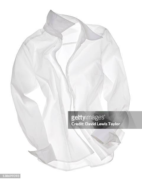 white shirt on light box - shirt foto e immagini stock