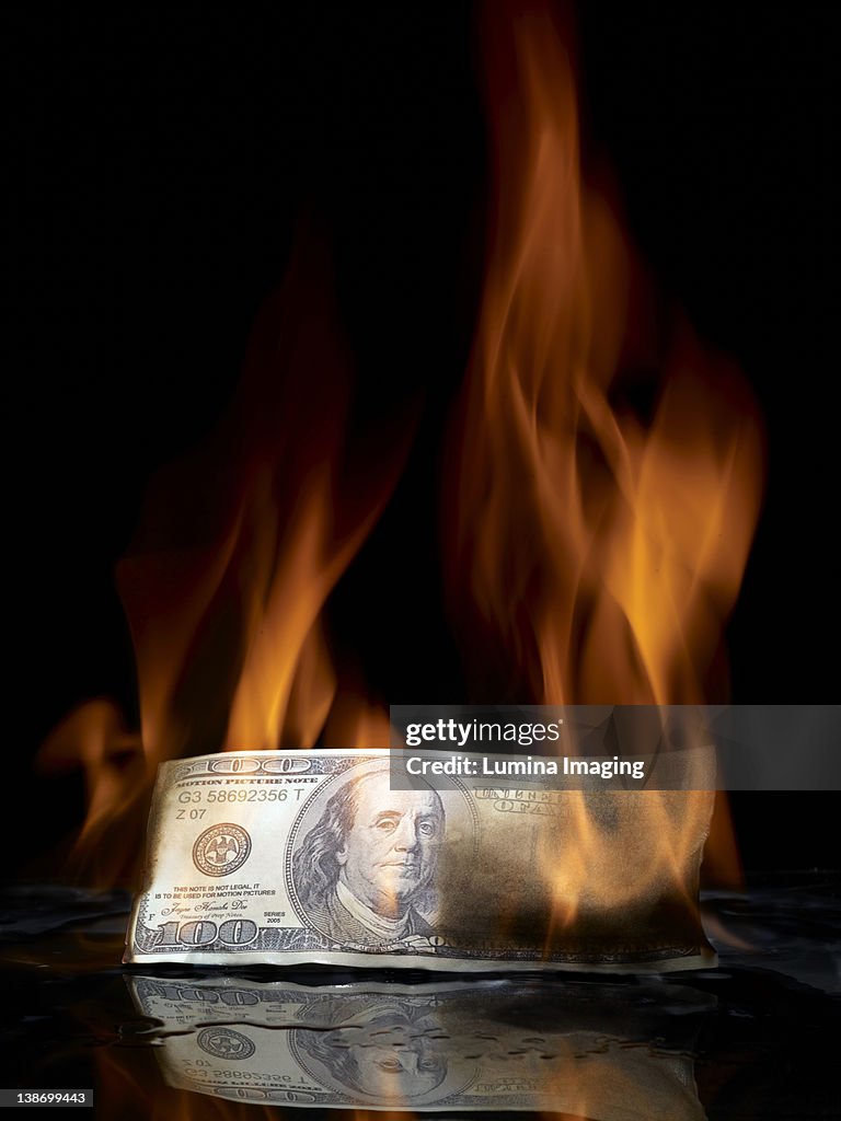 Burning money
