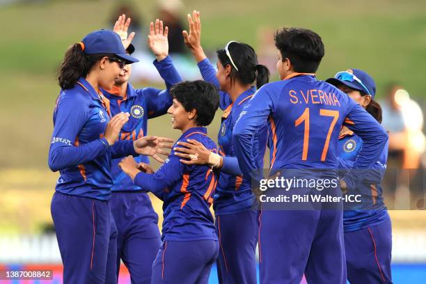 Poonam Yadav of India celebrates with team mates after dismissing Murshida Khatun of Bangladesh during the 2022 ICC Women's Cricket World Cup match...