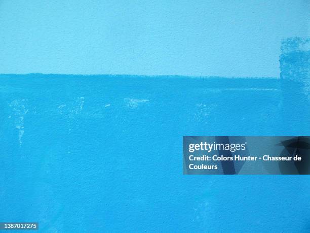 weathered blue paintings on an empty wall in paris - patina stock pictures, royalty-free photos & images