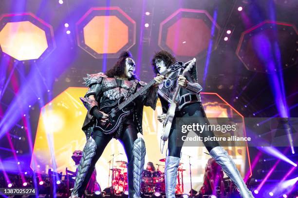 July 2023, North Rhine-Westphalia, Cologne: Gene Simmons , singer and bassist, Tommy Thayer, guitarist, of the U.S. Band Kiss are on stage during a...